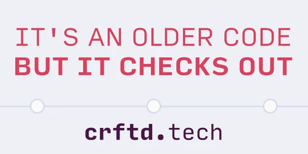 A rectangular sticker with crftd.tech at the bottom and the top reads "It's an older code, but it checks out" in bold pink letters on a light lilac background